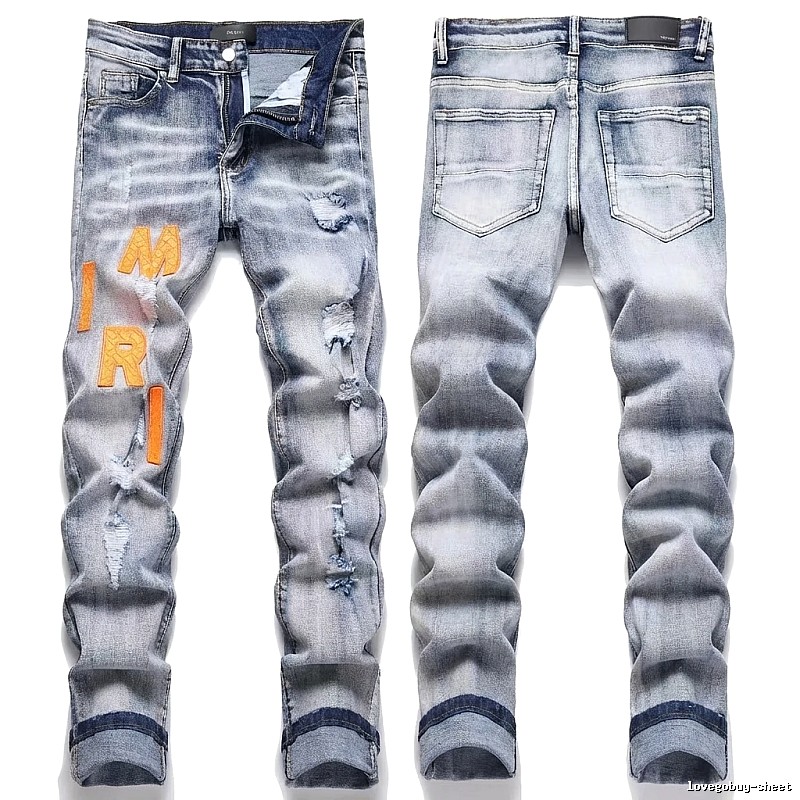 AMIRI Ripped Light Blue Jeans
